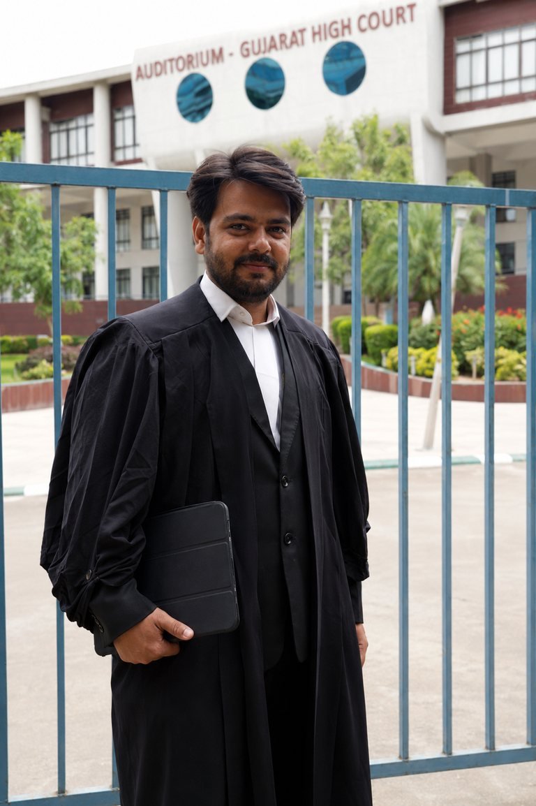 Adv. Brijesh Parekh in advocate's gown outside the Gujarat High Court, Ahmedabad